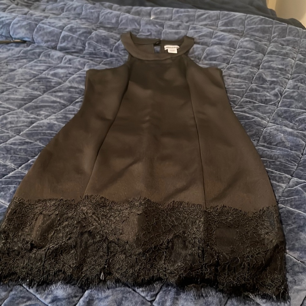 Super cute dress with lace trim on the bottom.